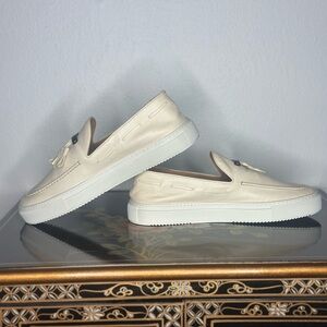 Elegant Cream Loafers with Tassel Accent